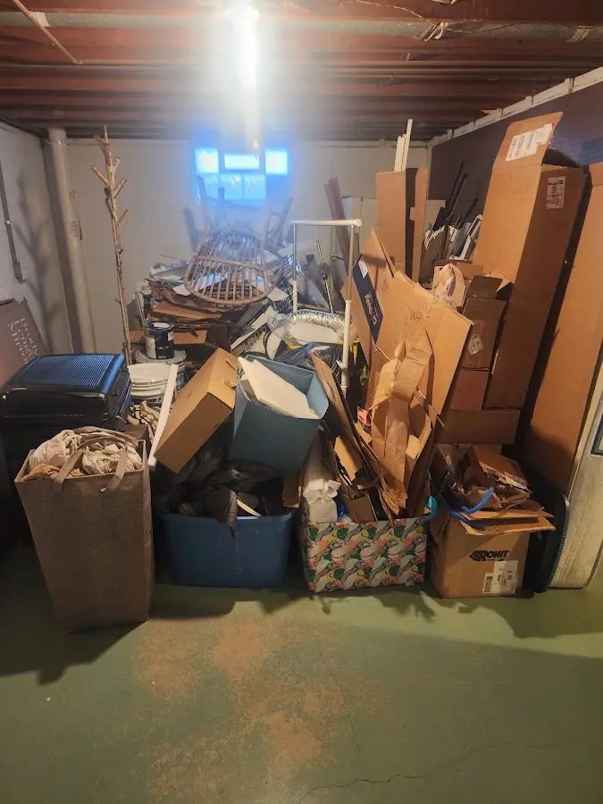 Roll-off dumpster container at job site for 15 Yard Dumpster Rental in Collierville